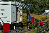 Van with bicycles and clothesline in a square in Dublin, Ireland