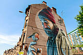 Portrait man with bird, robin, wall painting, mural, St Mungo&#39;s, artist Smug, Glasgow, Scotland UK