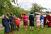 Spectators, horse racing, traditional, cross country, Hawick Common Ridings, guests of honor, hats, Borders, Scotland, UK