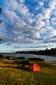 Tent with bike at the fortress ruins Bomarsund, Ahland Island, Ahland, Finland