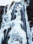 Hornstrandir nature reserve, ice, waterfall, rocks, Hornvik Bay, Iceland, Europe
