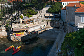 Hidden little bathing bay outside the city walls of Dubrovnik, Dalmatia, Croatia.