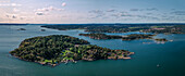 Archipelago on Tjörn on the west coast of Sweden from above, sunshine on the day with blue sky