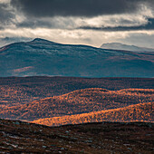 Mountain landscape with snowy peaks in Pieljekaise National Park in autumn in Lapland in Sweden