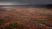 River along the Wilderness Road, on the Vildmarksvagen plateau in Jämtland in autumn in Sweden from above