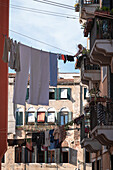 View of a street train with clotheslines in Cannareggio, Venice, Veneto, Italy, Europe