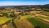 Aerial view of the idyllic village with fields and villages on the Gersprenz in southern Hesse, Germany