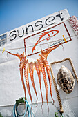 Squid hanging on clothesline, Oia, Santorini, Santorin, Cyclades, Aegean Sea, Mediterranean Sea, Greece, Europe
