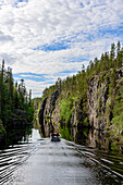 Tour boat on Julma Ölkky canyon lake, Finland