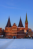 St. Petri Church with houses at Holsten Tor with full moon, Lübeck, Bay of Lübeck, Schleswig Holstein, Germany