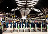 Turnstile at a underground railway station, London Paddington Station, London, England