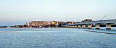 Panorama looking across calm broadwater and bridge to apartments on Ephraim Island