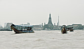 Tourist boats on Chao Phraya River in Thailand