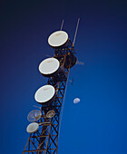Telecommunication Transmitter Tower against blue sky