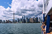 Toronto, Downtown Toronto skyline with Rogers Center and CN Tower from Toronto Island Ferry Boat