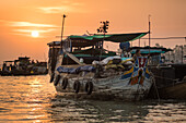 Vietnamese trade boat at sunrise