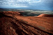 Clouds over sandstone rock formations, Uluru, Uluru-Kata Tjuta National Park, Northern Territory, Australia