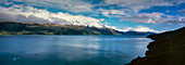 Snow capped Southern Alps on the edge of Lake Wakatipu