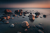 Long exposure of sunset at the beach at Hjerpsted Sogn, Denmark