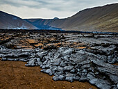 Pahoehoe lava spreads across the landscape around Fagradalsfjall volcano, Volcanic eruption at Geldingadalir, Iceland
