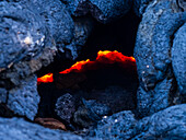Hot magma visible underneath cooled lava crust, Fagradalsfjall volcano, Volcanic eruption at Geldingadalir, Iceland