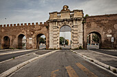 One of the ancient entrance wall in the old quarter of Rome also called the Aurelian walls Italy