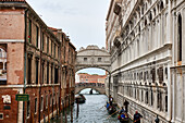 View of the famous Ponte della Paglia stone bridge with origins from 1360, renewed in 1847 and offering a view of the Bridge of Sighs, Venice, Italy, Europe