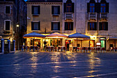 Evening view of the Ristorante / Bar Al Cavallo from Campo Santi Giovanni e Paolo, Venice, Italy, Europe