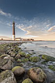 Sorve Tuletorn Lighthouse, Saare, Saaremaa, Estonia, Blatikum, Baltic Sea. stones beach.