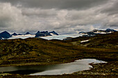 Sognefjellvegen in Norway, lonely country road, high plateau, glacier