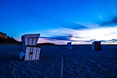 Standing baskets at night under a starry sky on the Baltic Sea beach on the Darß. Darß, Fischland-Darß-Zingst, Mecklenburg-Western Pomerania, Western Pomerania Lagoon Area National Park, Baltic Sea, Germany