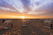 Sunset in the sea, beach chairs on the beach, Baltic Sea, Western Pomerania Lagoon Area National Park, Fischland-Darß-Zingst, Mecklenburg-West Pomerania, Germany