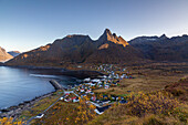 View of small fishing village Mefjordvaer, Senja, Troms, Norway. mountains in the background.