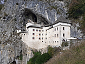 Medieval castle in the rock. Predjama Cave Castle, Postojna, Slovenia.