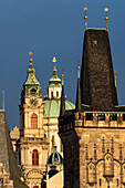 Nicholas Church in Prague's Lesser Town, Bridge Tower in front, Charles Bridge, Prague, Czech Republic