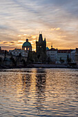 Charles Bridge, Old Town Bridge Tower, Church of the Cross, dawn, Prague, Czech Republic