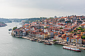 Cais de Ribeira waterfront promenade and historic old town of Porto, Portugal