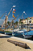 Cannon and Fishing boats in Sanary Harbour, Sanary sur Mer, Var , south of Franc