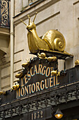 L'Escargot Montorgueil Restaurant außen mit goldenen Schnecken auf dem Schild Rue Montor