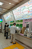 Buying tickets, Tokyo subway, Japan