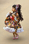 Young girl in dress, Maekawa Iris festival, Itako City, Japan