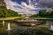Imperial palace and fountain in the spa gardens of Bad Oeynhausen in the evening light, North Rhine-Westphalia, Germany
