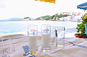 Greek ouzo served in a taverna in Kokkari on the island of Samos in Greece
