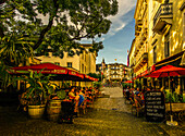 Bistros on Sophienstrasse in Baden-Baden with a view of Leopoldsplatz in the evening light, Baden-Württemberg, Germany