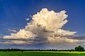 Storm cloud over the Weilheimer Moos, Bavaria, Germany