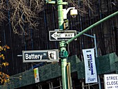 New York City,US. Battery Pl. street sign and traffic indications