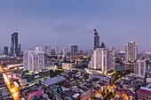 Thailand,Bangkok,Riverside Area,high angle city skyline by Chao Phraya River,dawn.