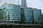 Office buildings at The More London Development on the Thames Waterfront. Behind we see a partial view of the Shard. London,England,Great Britain.