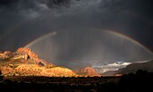 A rainbow appears during a monsoonal thunderstorm at Zion National Park,Utah.