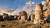 Statue heads at sunrise,from right,Antiochus & Eagle in front of the stone pyramid 62 BC Royal Tomb of King Antiochus I Theos of Commagene,east Terrace,Mount Nemrut or Nemrud Dagi summit,near AdA±yaman,Turkey.